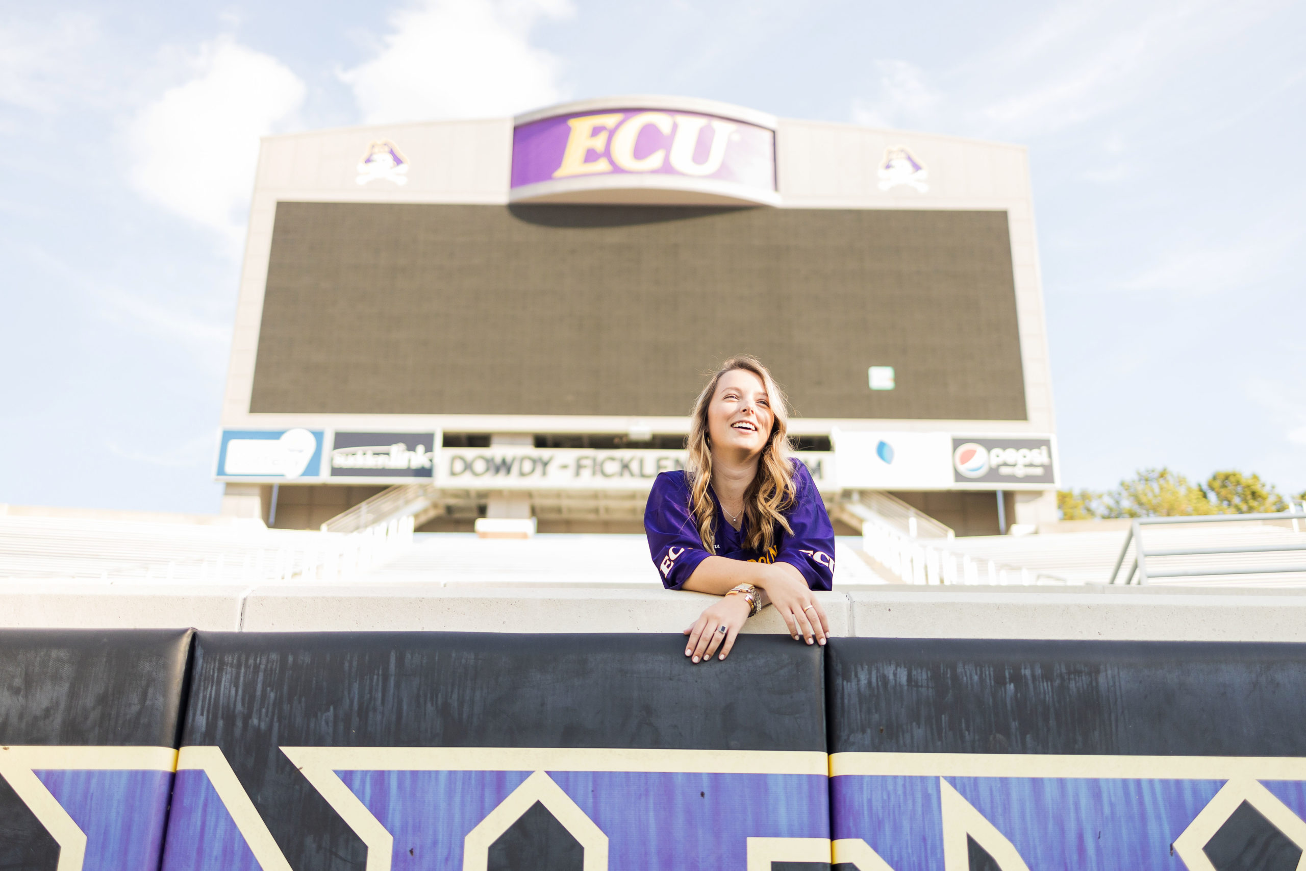 Sarah Hilts photography, senior photographer , nc senior photographer , east Carolina graduation , ECU cap & gown session , Graduation ECU , Cap & gown session, graduation day , Purple and gold , ECU pirates. 