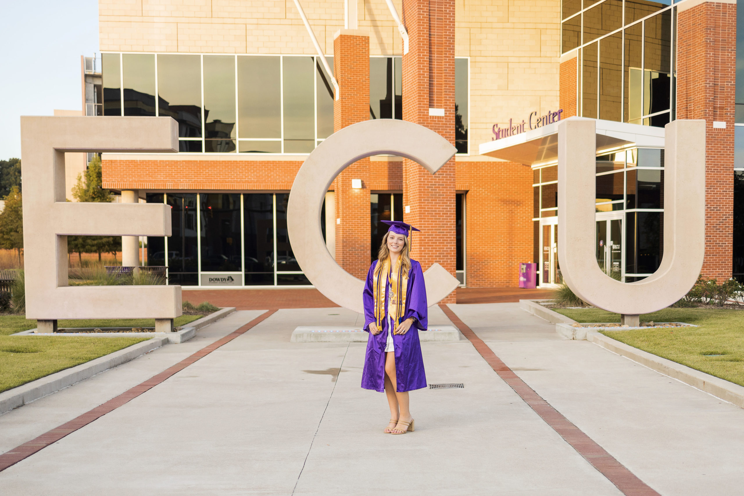 Sarah Hilts photography, senior photographer , nc senior photographer , east Carolina graduation , ECU cap & gown session , Graduation ECU , Cap & gown session, graduation day , Purple and gold , ECU pirates. 