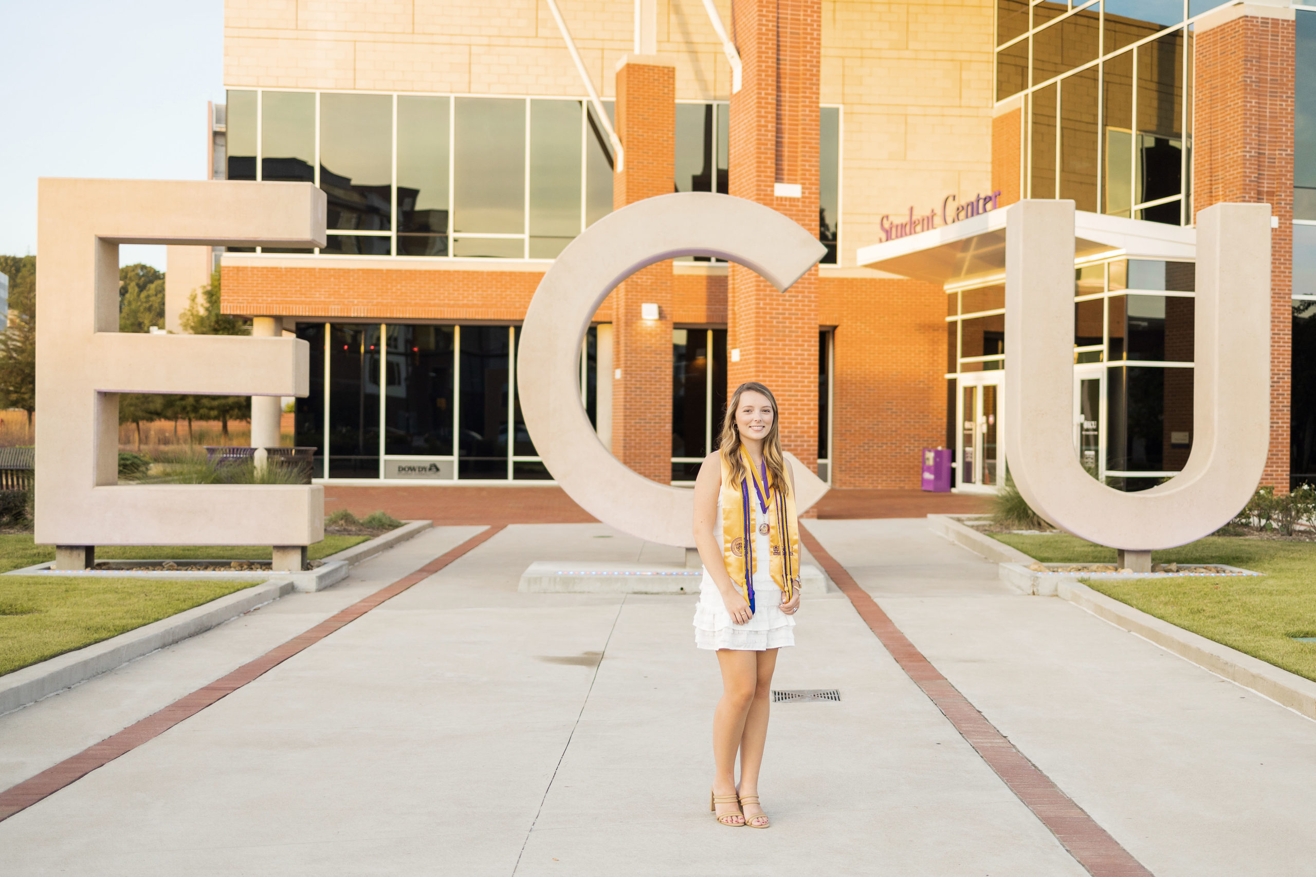 Sarah Hilts photography, senior photographer , nc senior photographer , east Carolina graduation , ECU cap & gown session , Graduation ECU , Cap & gown session, graduation day , Purple and gold , ECU pirates. Hilts photography, senior photographer , nc senior photographer , east Carolina graduation , ECU cap & gown session , Graduation ECU , Cap & gown session, graduation day , Purple and gold , ECU pirates. 