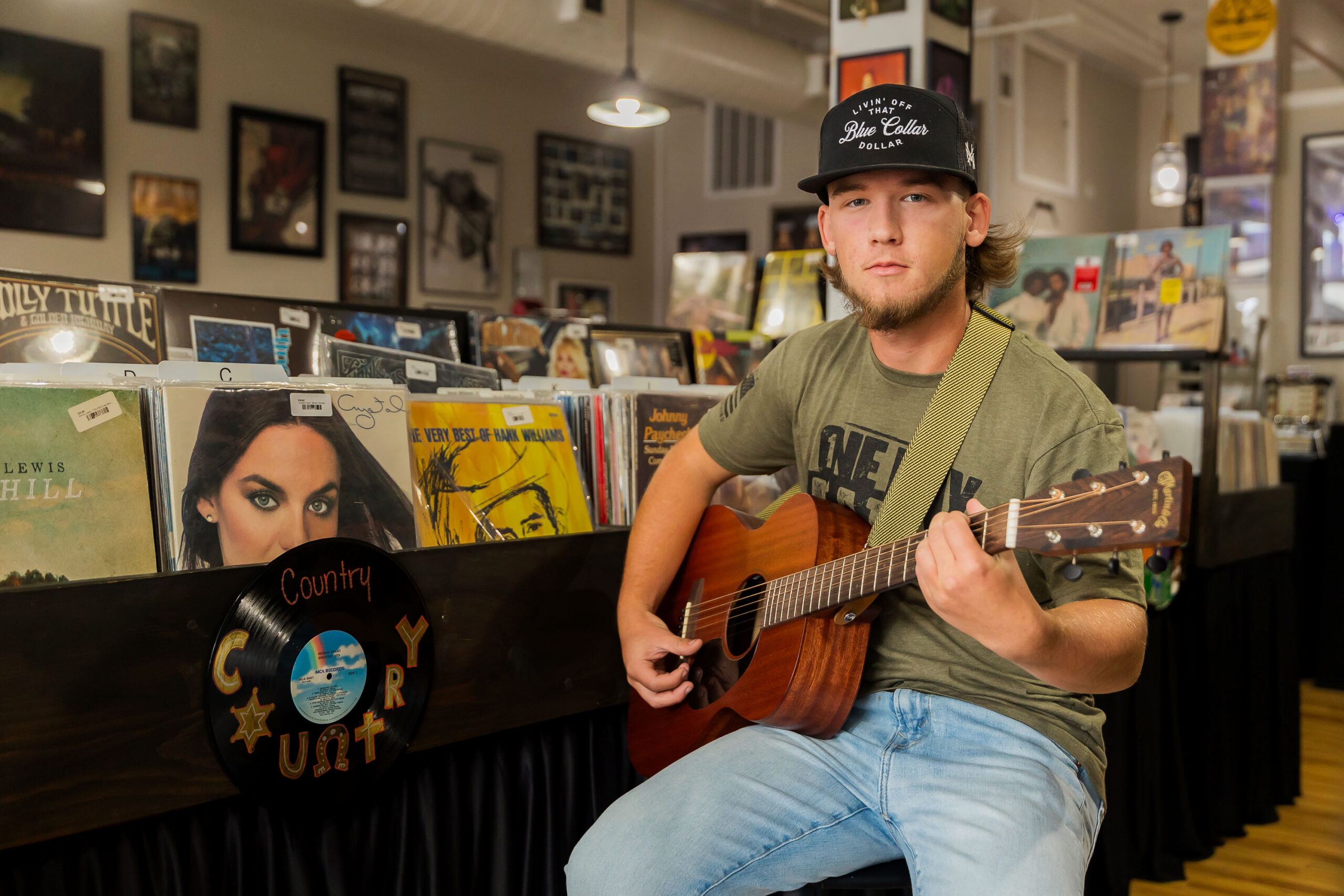 senior boy with guitar record store Elizabeth City NC