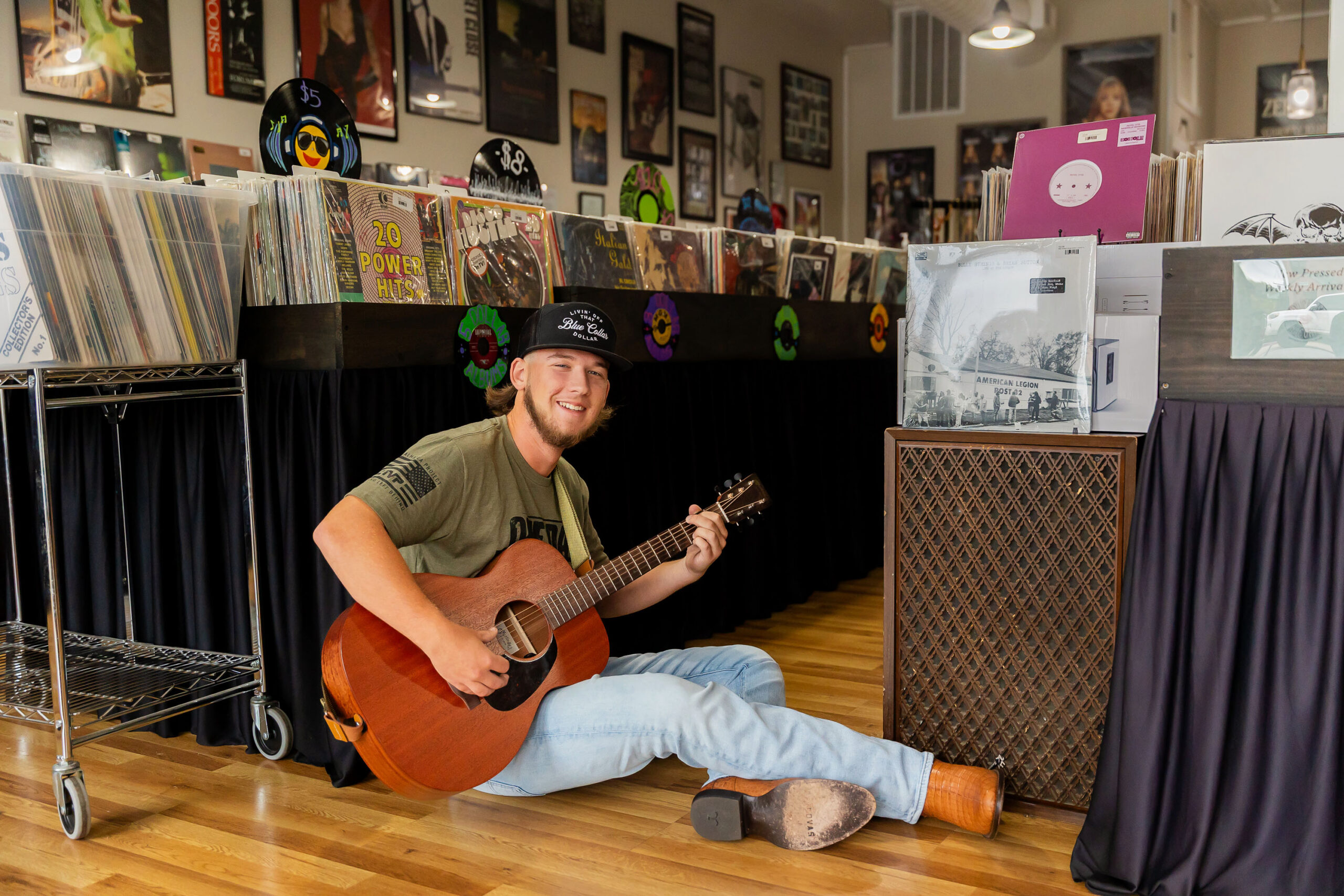senior boy with guitar record store Elizabeth City NC