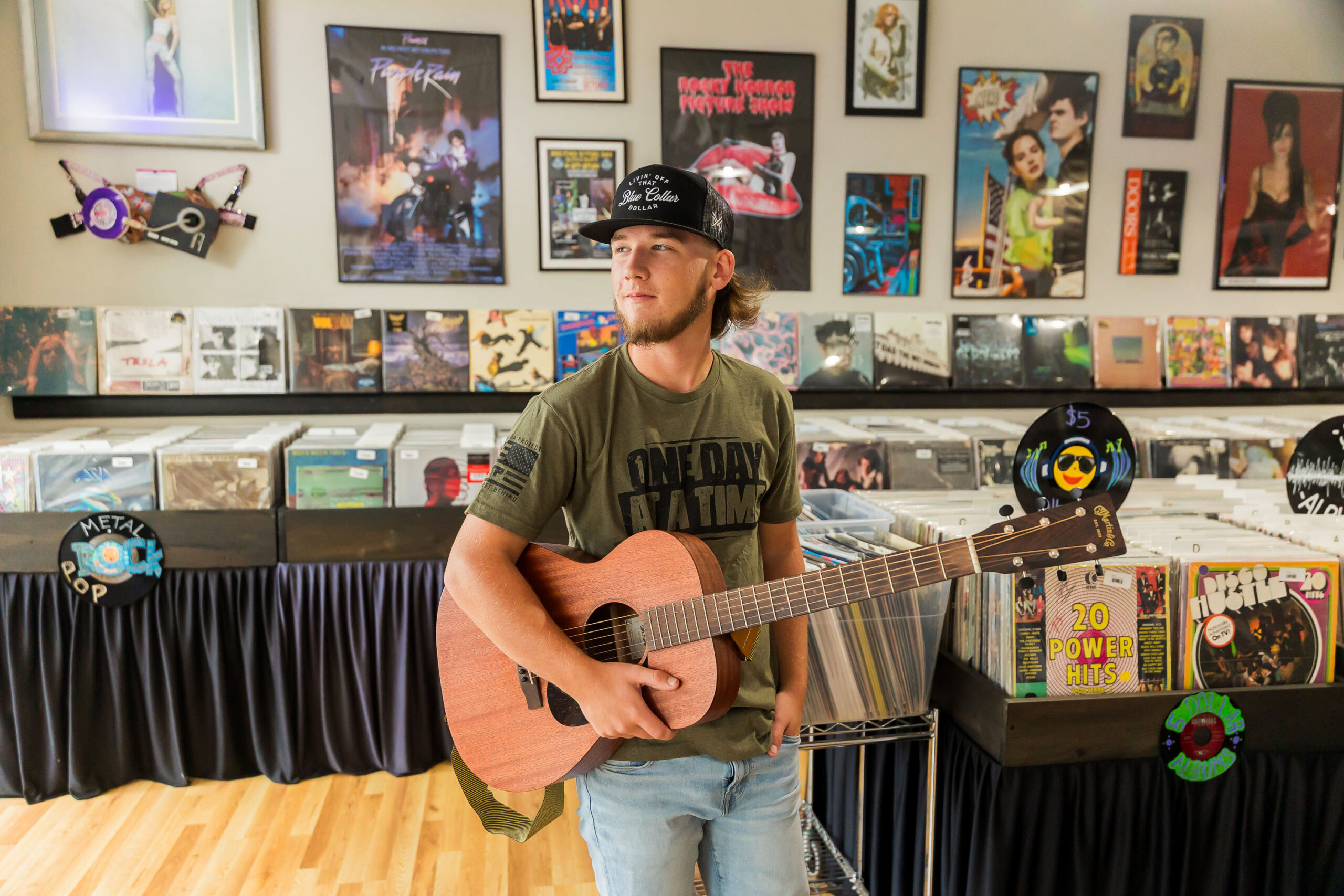 senior boy with guitar record store Elizabeth City NC