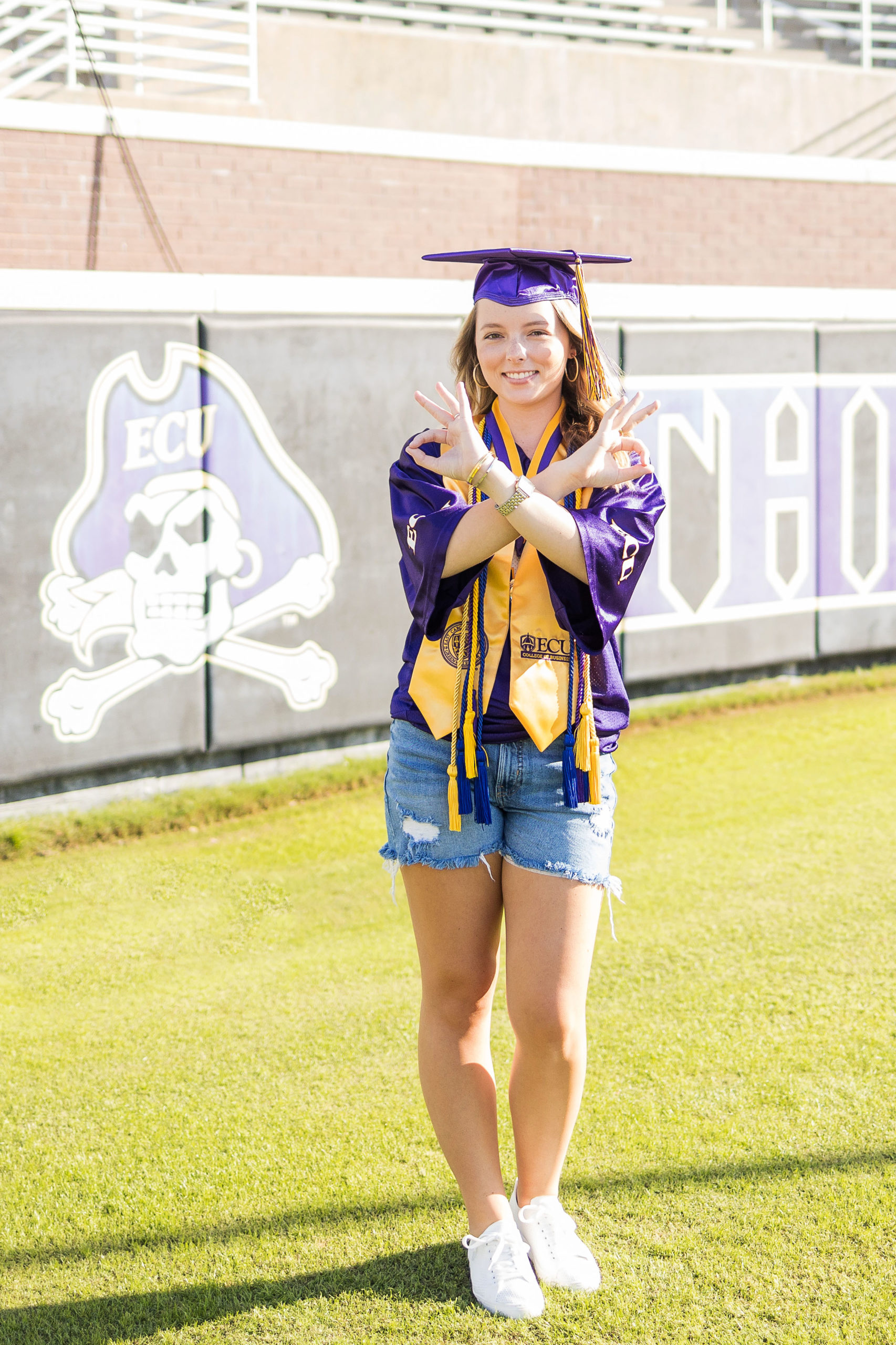 Sarah Hilts photography, senior photographer , nc senior photographer , east Carolina graduation , ECU cap & gown session , Graduation ECU , Cap & gown session, graduation day , Purple and gold , ECU pirates.