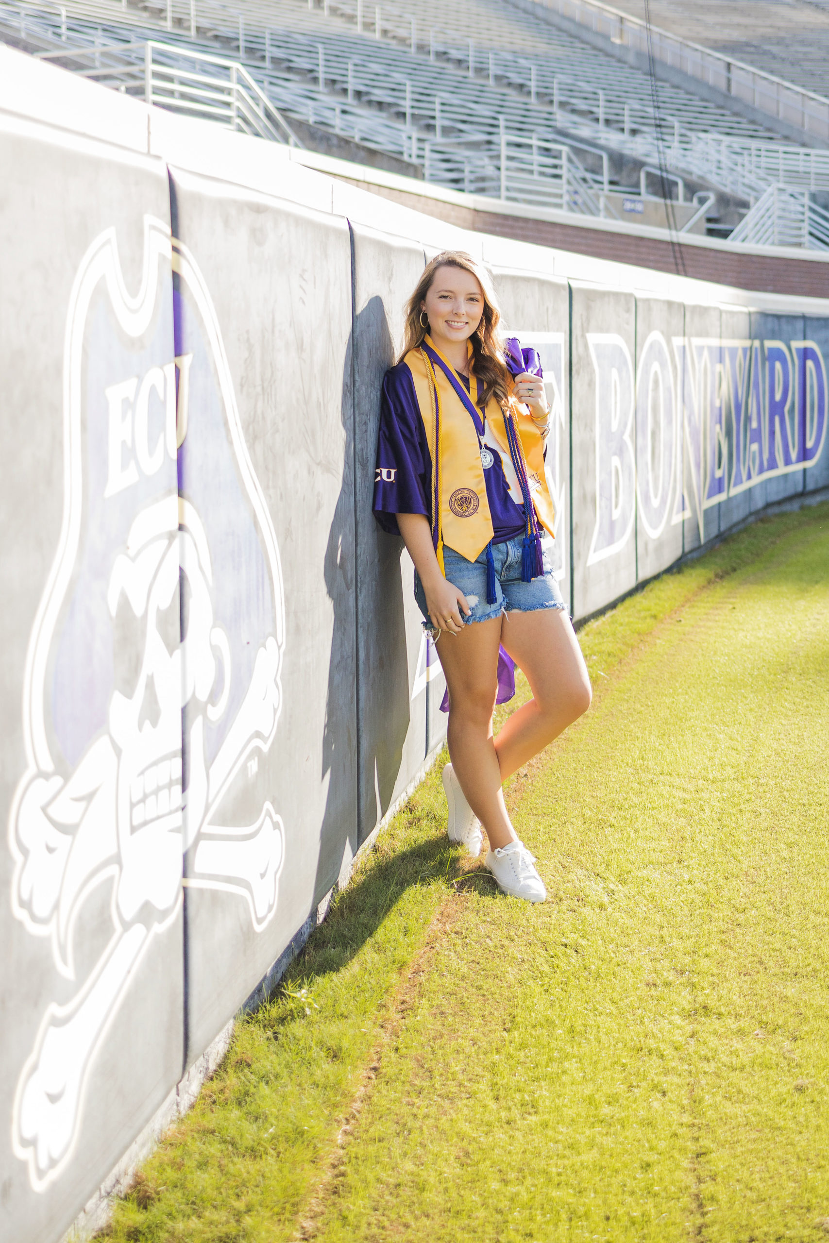 Sarah Hilts photography, senior photographer , nc senior photographer , east Carolina graduation , ECU cap & gown session , Graduation ECU , Cap & gown session, graduation day , Purple and gold , ECU pirates.