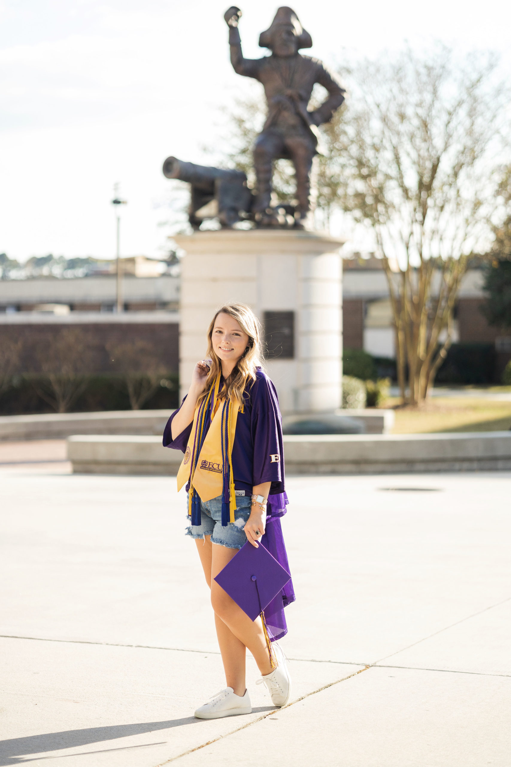 Sarah Hilts photography, senior photographer , nc senior photographer , east Carolina graduation , ECU cap & gown session , Graduation ECU , Cap & gown session, graduation day , Purple and gold , ECU pirates.