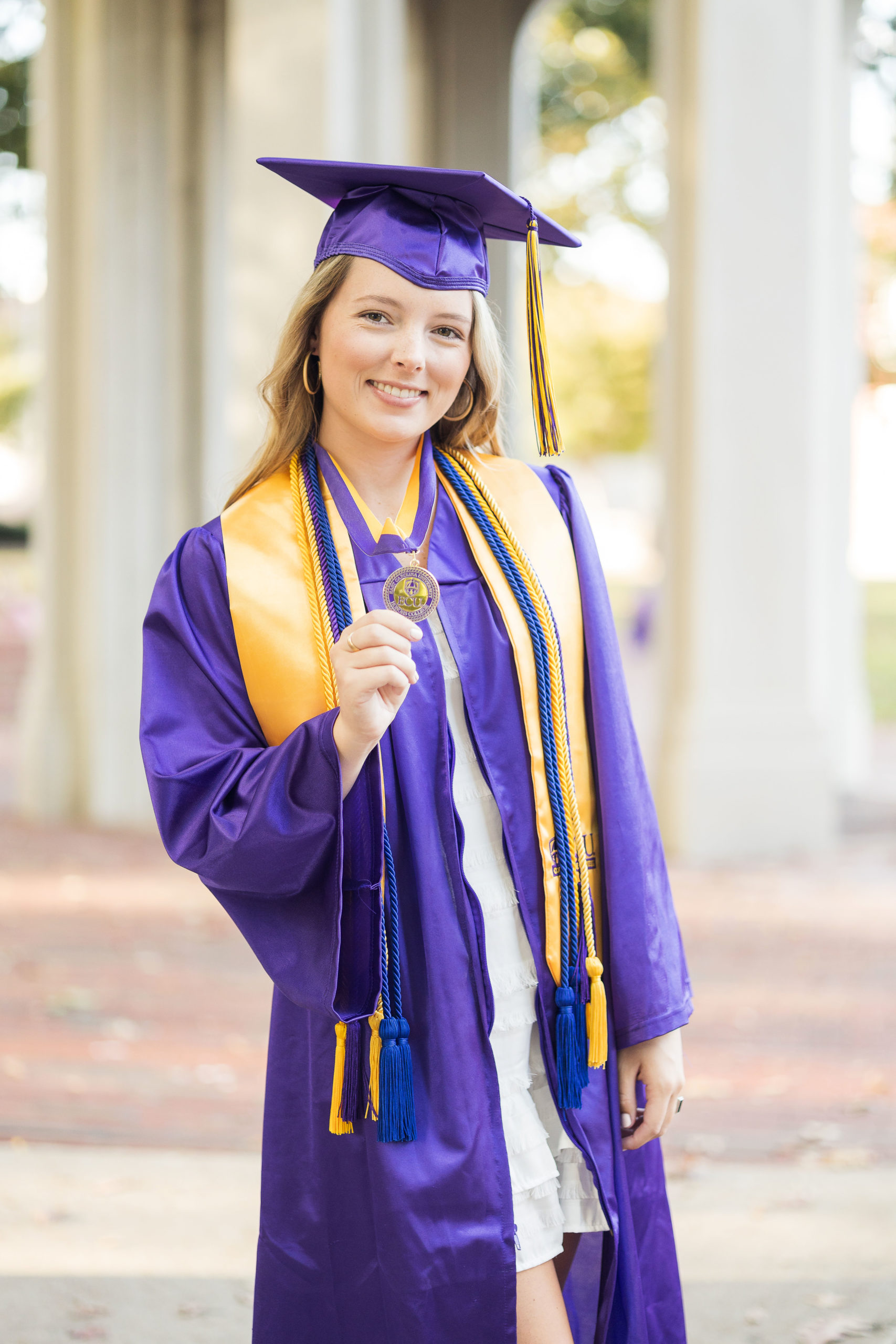 Sarah Hilts photography, senior photographer , nc senior photographer , east Carolina graduation , ECU cap & gown session , Graduation ECU , Cap & gown session, graduation day , Purple and gold , ECU pirates.