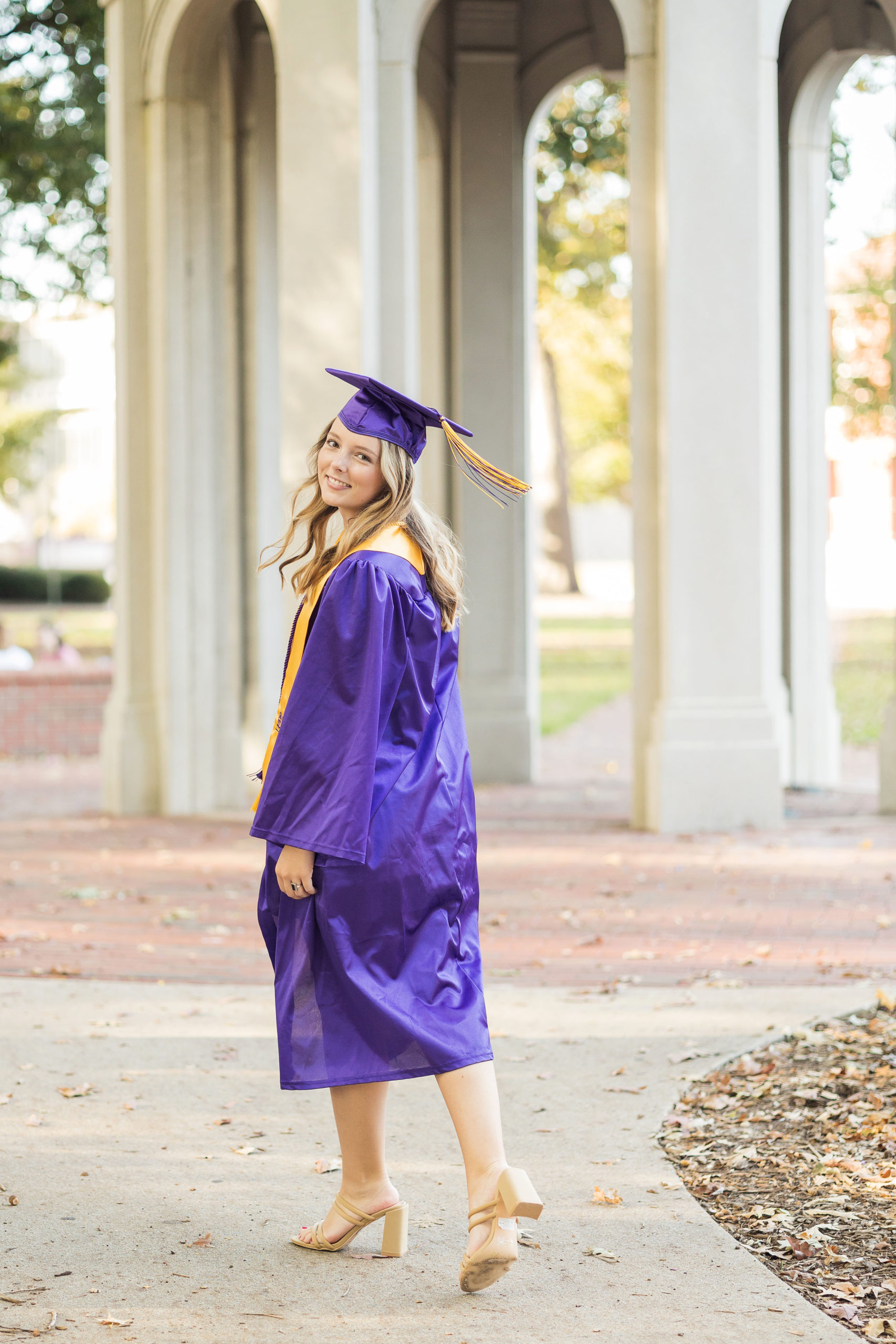 Sarah Hilts photography, senior photographer , nc senior photographer , east Carolina graduation , ECU cap & gown session , Graduation ECU , Cap & gown session, graduation day , Purple and gold , ECU pirates.