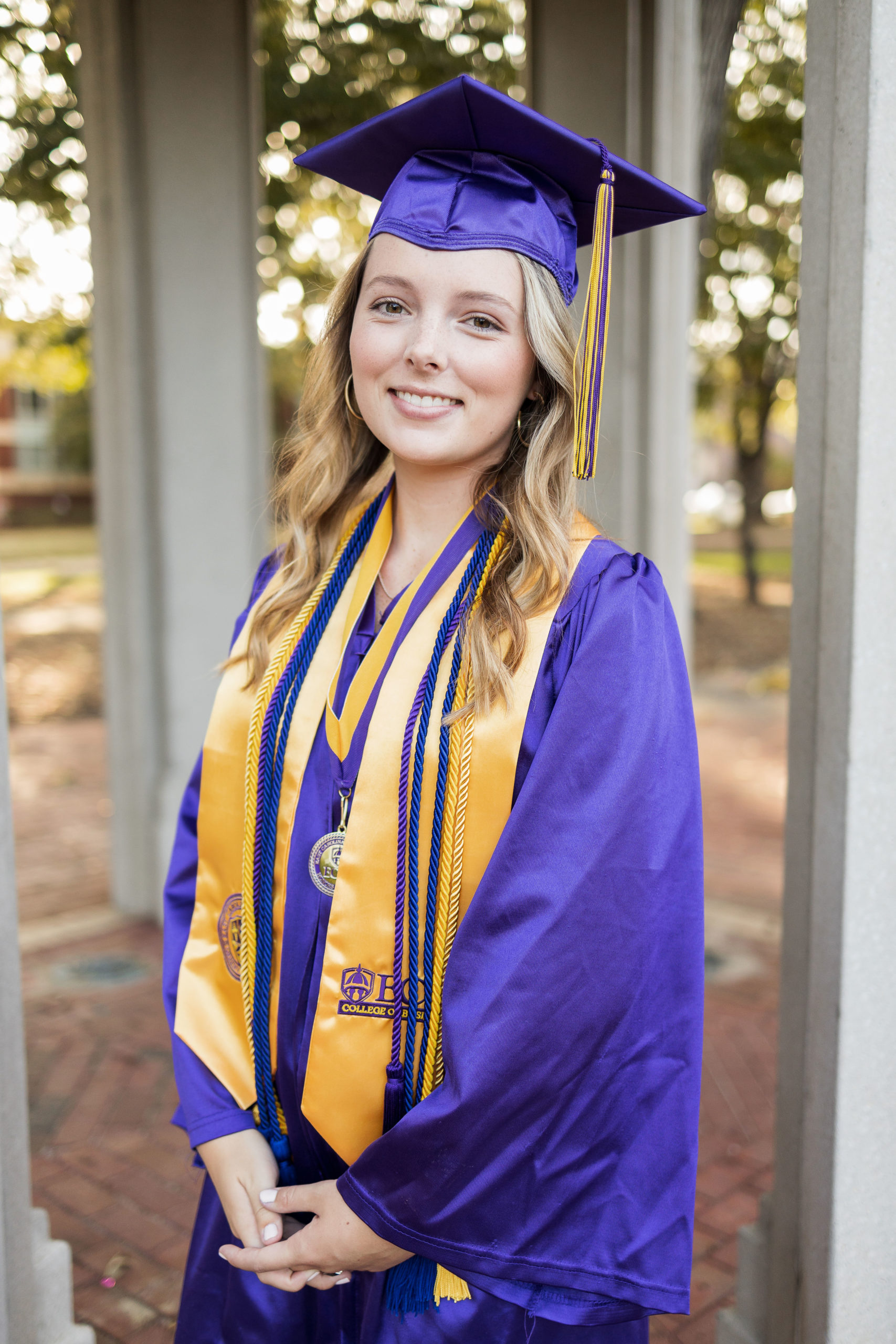 Sarah Hilts photography, senior photographer , nc senior photographer , east Carolina graduation , ECU cap & gown session , Graduation ECU , Cap & gown session, graduation day , Purple and gold , ECU pirates.