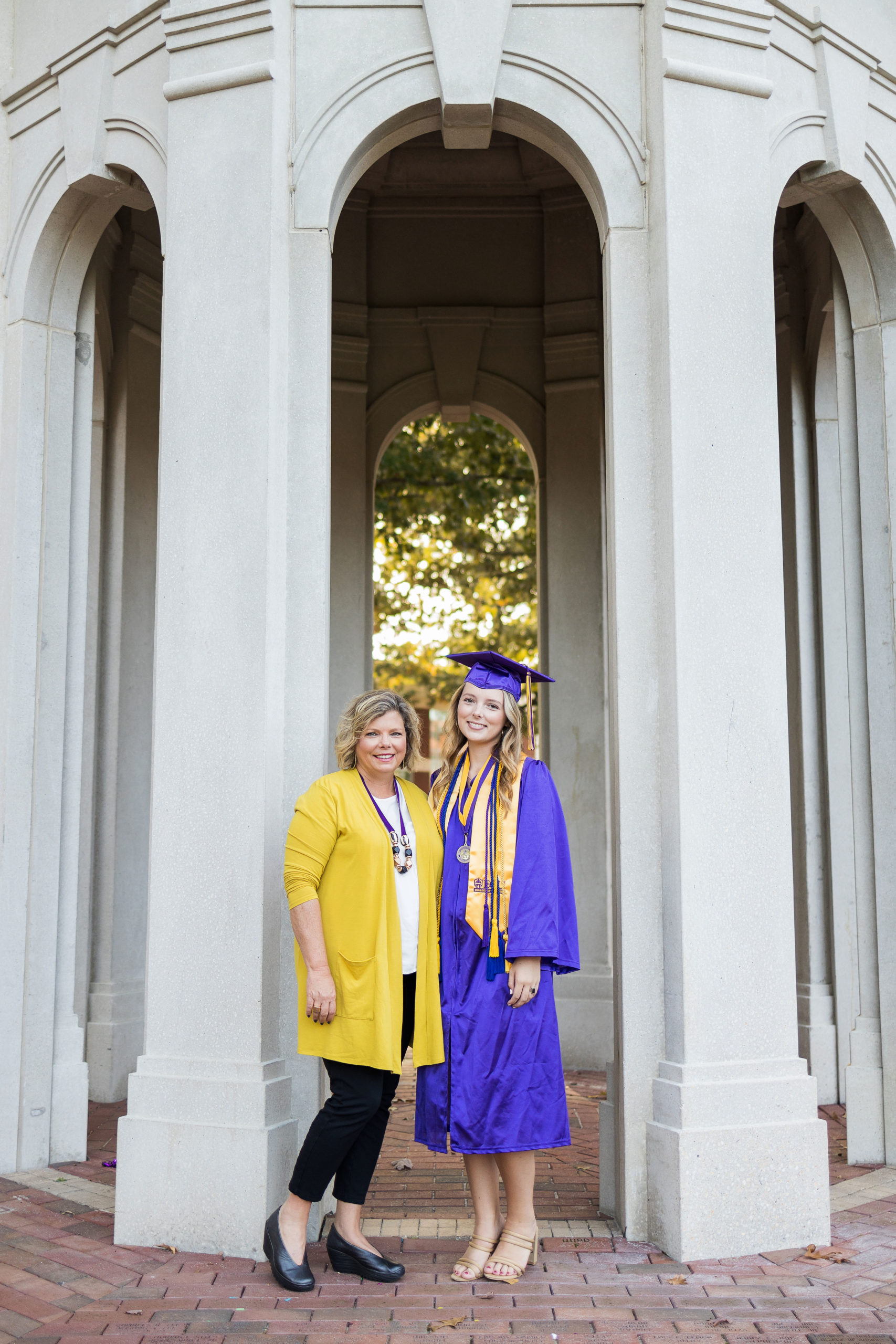 Sarah Hilts photography, senior photographer , nc senior photographer , east Carolina graduation , ECU cap & gown session , Graduation ECU , Cap & gown session, graduation day , Purple and gold , ECU pirates.