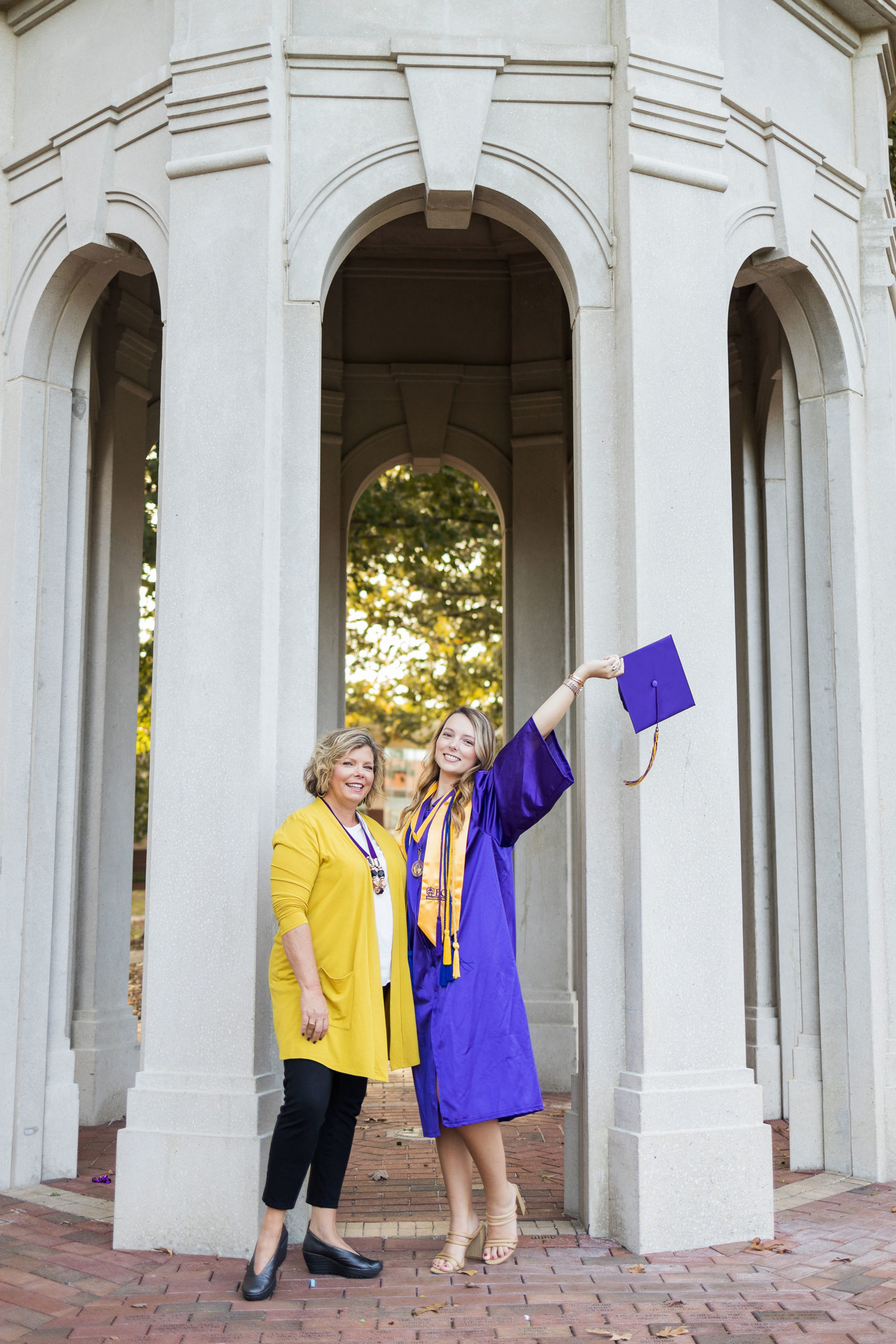 Sarah Hilts photography, senior photographer , nc senior photographer , east Carolina graduation , ECU cap & gown session , Graduation ECU , Cap & gown session, graduation day , Purple and gold , ECU pirates.