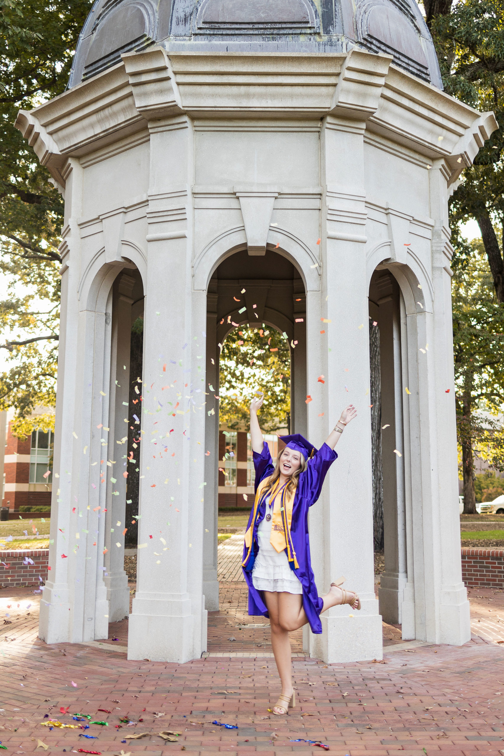 Sarah Hilts photography, senior photographer , nc senior photographer , east Carolina graduation , ECU cap & gown session , Graduation ECU , Cap & gown session, graduation day , Purple and gold , ECU pirates.