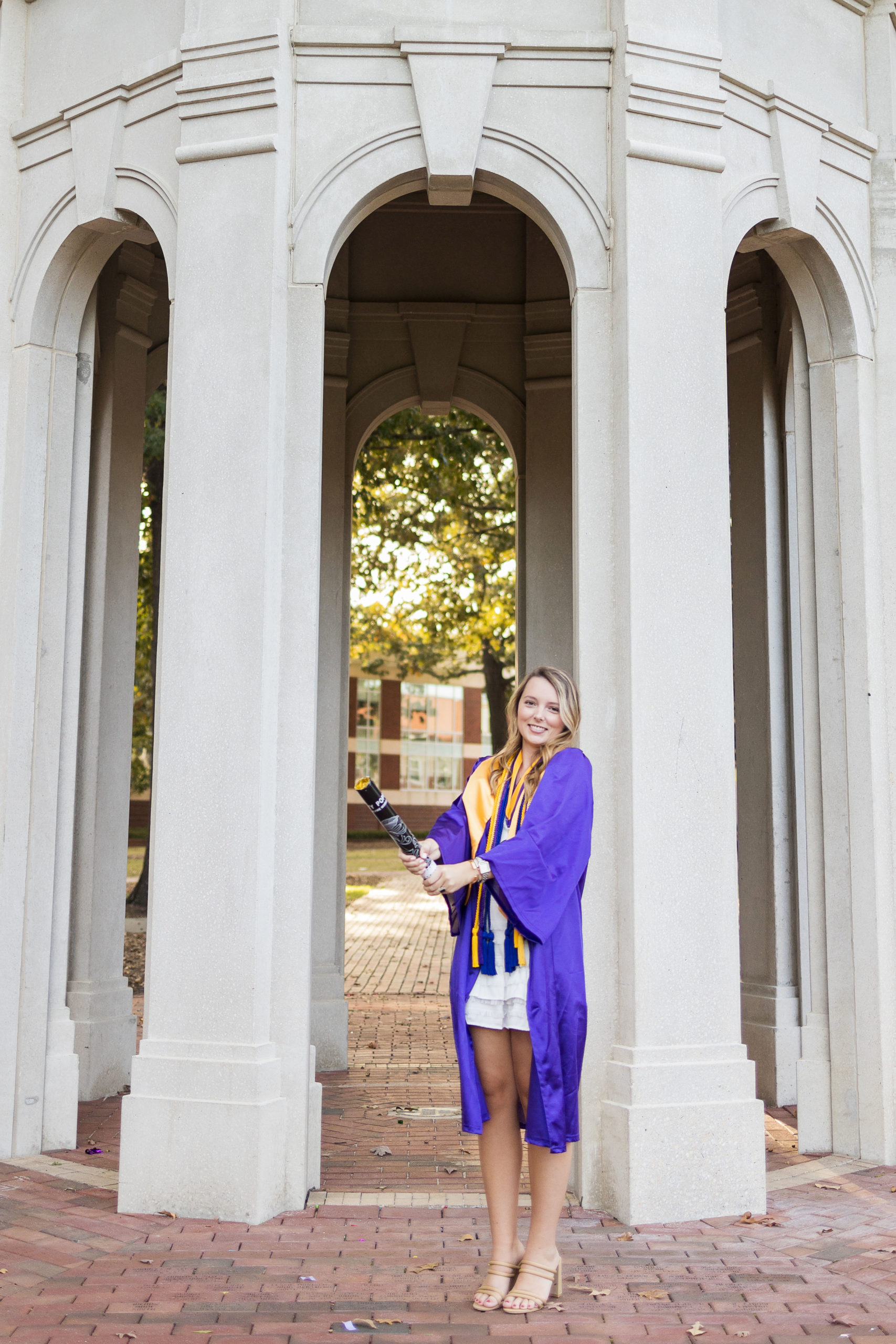 Sarah Hilts photography, senior photographer , nc senior photographer , east Carolina graduation , ECU cap & gown session , Graduation ECU , Cap & gown session, graduation day , Purple and gold , ECU pirates.