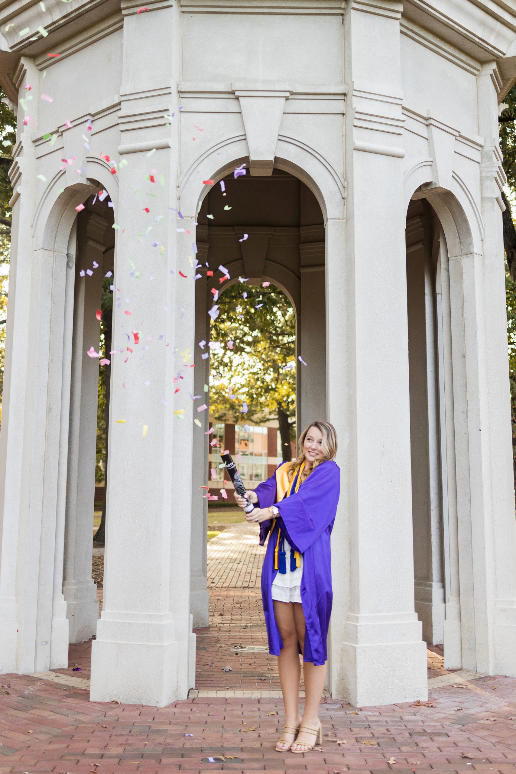 Sarah Hilts photography, senior photographer , nc senior photographer , east Carolina graduation , ECU cap & gown session , Graduation ECU , Cap & gown session, graduation day , Purple and gold , ECU pirates.