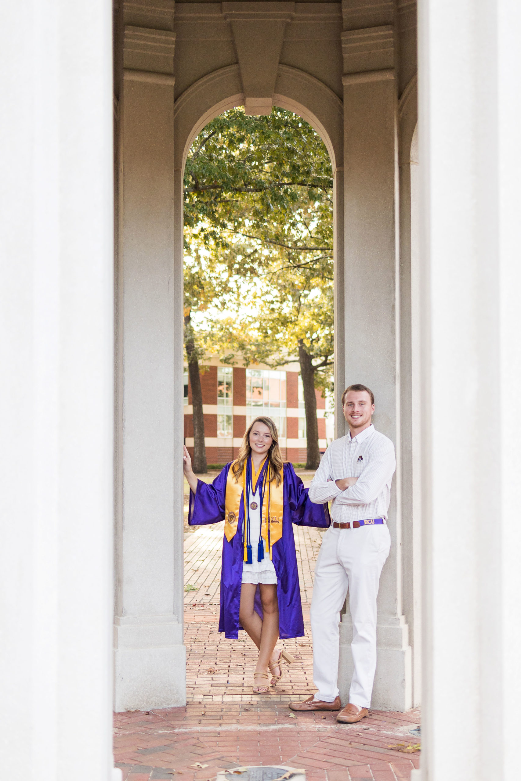 Sarah Hilts photography, senior photographer , nc senior photographer , east Carolina graduation , ECU cap & gown session , Graduation ECU , Cap & gown session, graduation day , Purple and gold , ECU pirates.