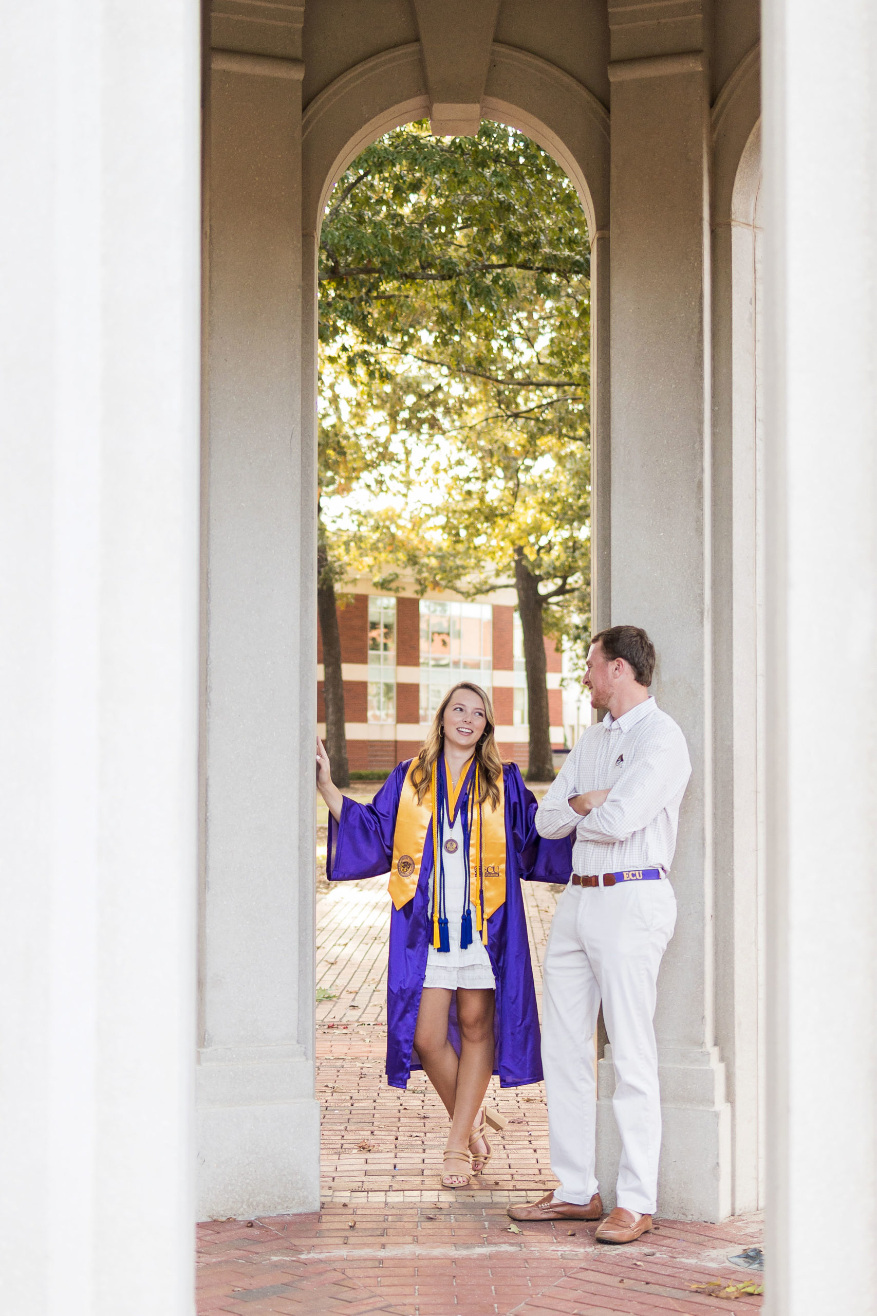 Sarah Hilts photography, senior photographer , nc senior photographer , east Carolina graduation , ECU cap & gown session , Graduation ECU , Cap & gown session, graduation day , Purple and gold , ECU pirates.