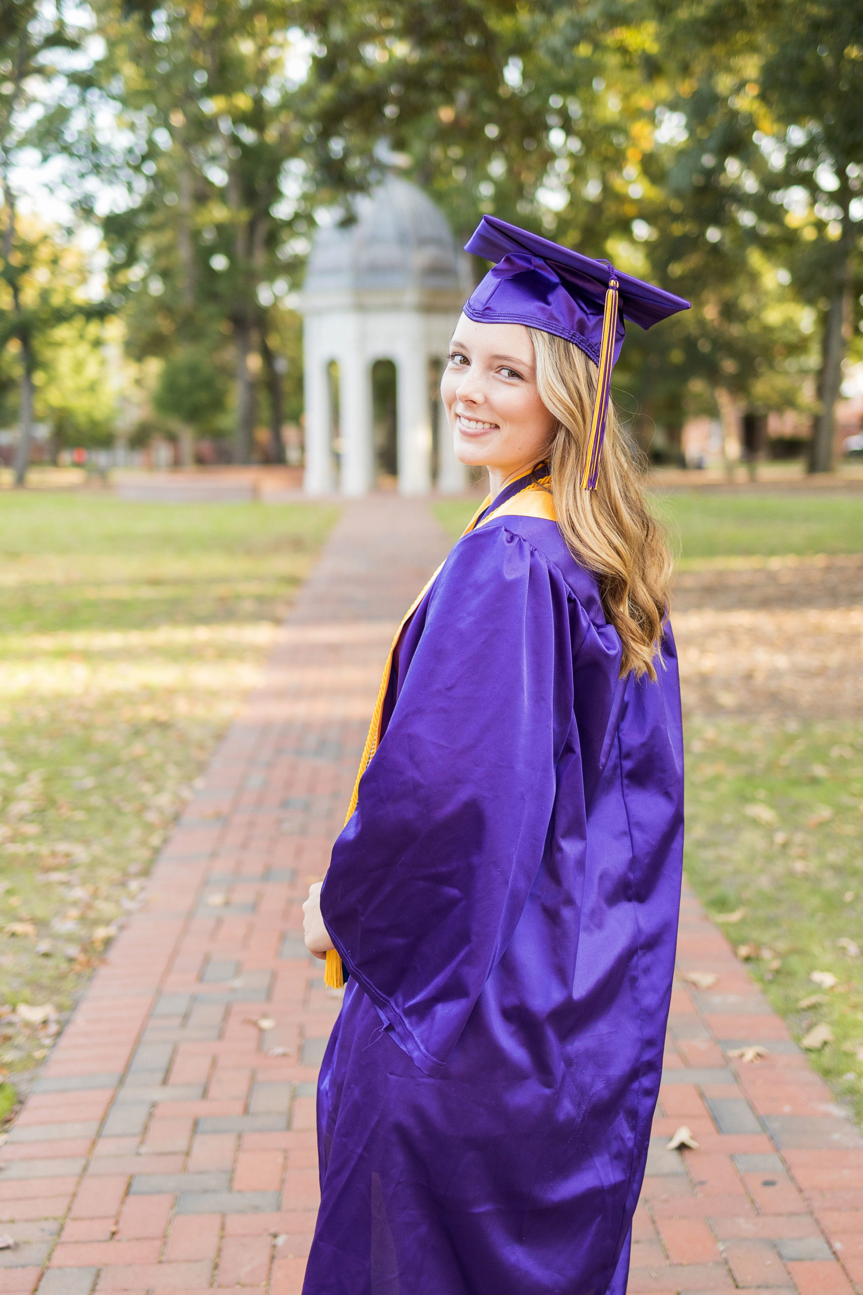 Sarah Hilts photography, senior photographer , nc senior photographer , east Carolina graduation , ECU cap & gown session , Graduation ECU , Cap & gown session, graduation day , Purple and gold , ECU pirates.