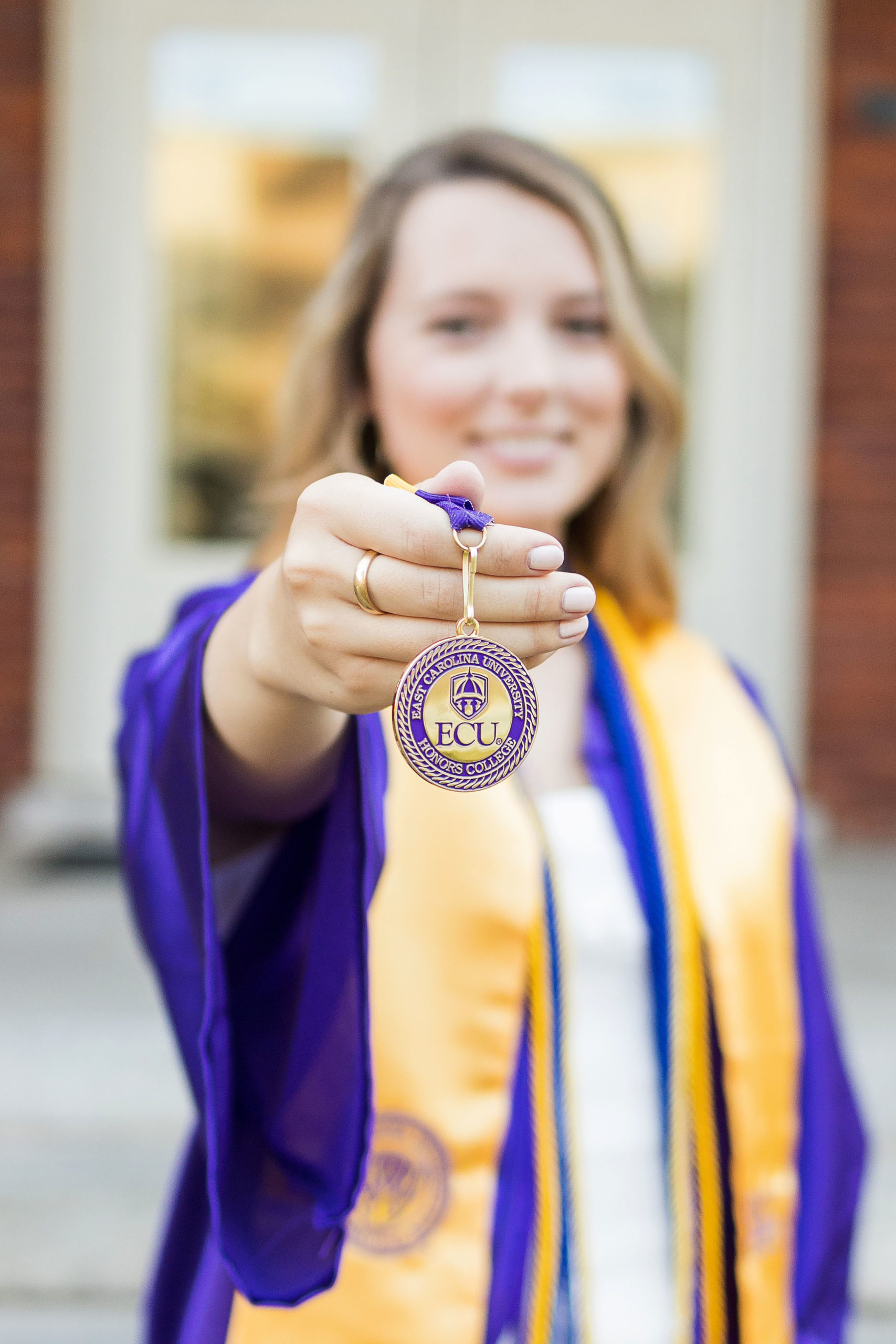 Sarah Hilts photography, senior photographer , nc senior photographer , east Carolina graduation , ECU cap & gown session , Graduation ECU , Cap & gown session, graduation day , Purple and gold , ECU pirates.