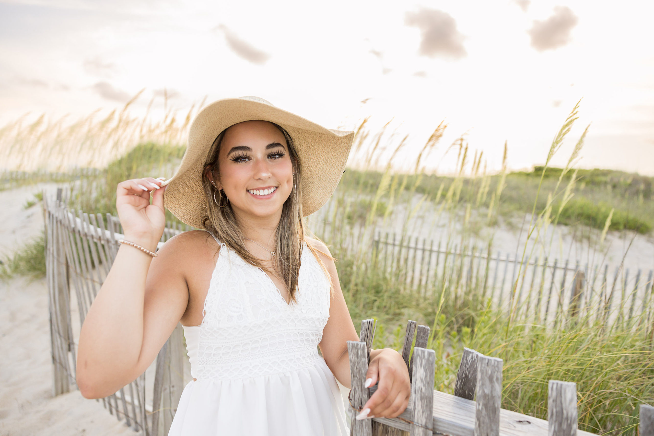 outerbanks North carolina , beach senior portraits, nags head, lighthouse , Bodie island lighthouse , destination senior portraits , senior pics , beach senior pictures , golden sunshine senior portraits , senior girl ,class of 2023 , sarah hilts photogrpahy, nc senior photographer , obx senior photographer , nags head senior portraits