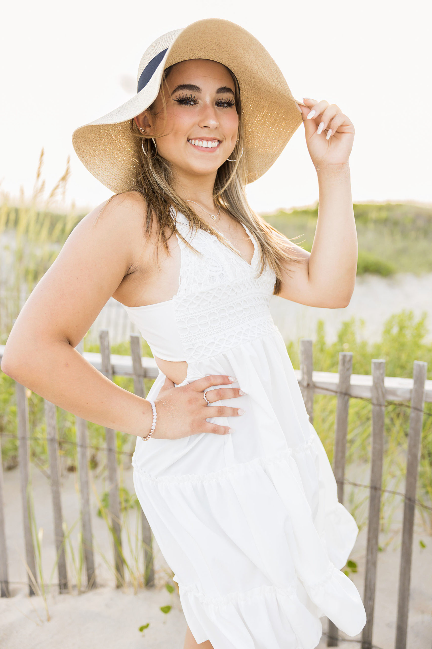 outerbanks North carolina , beach senior portraits, nags head, lighthouse , Bodie island lighthouse , destination senior portraits , senior pics , beach senior pictures , golden sunshine senior portraits , senior girl ,class of 2023 , sarah hilts photogrpahy, nc senior photographer , obx senior photographer , nags head senior portraits