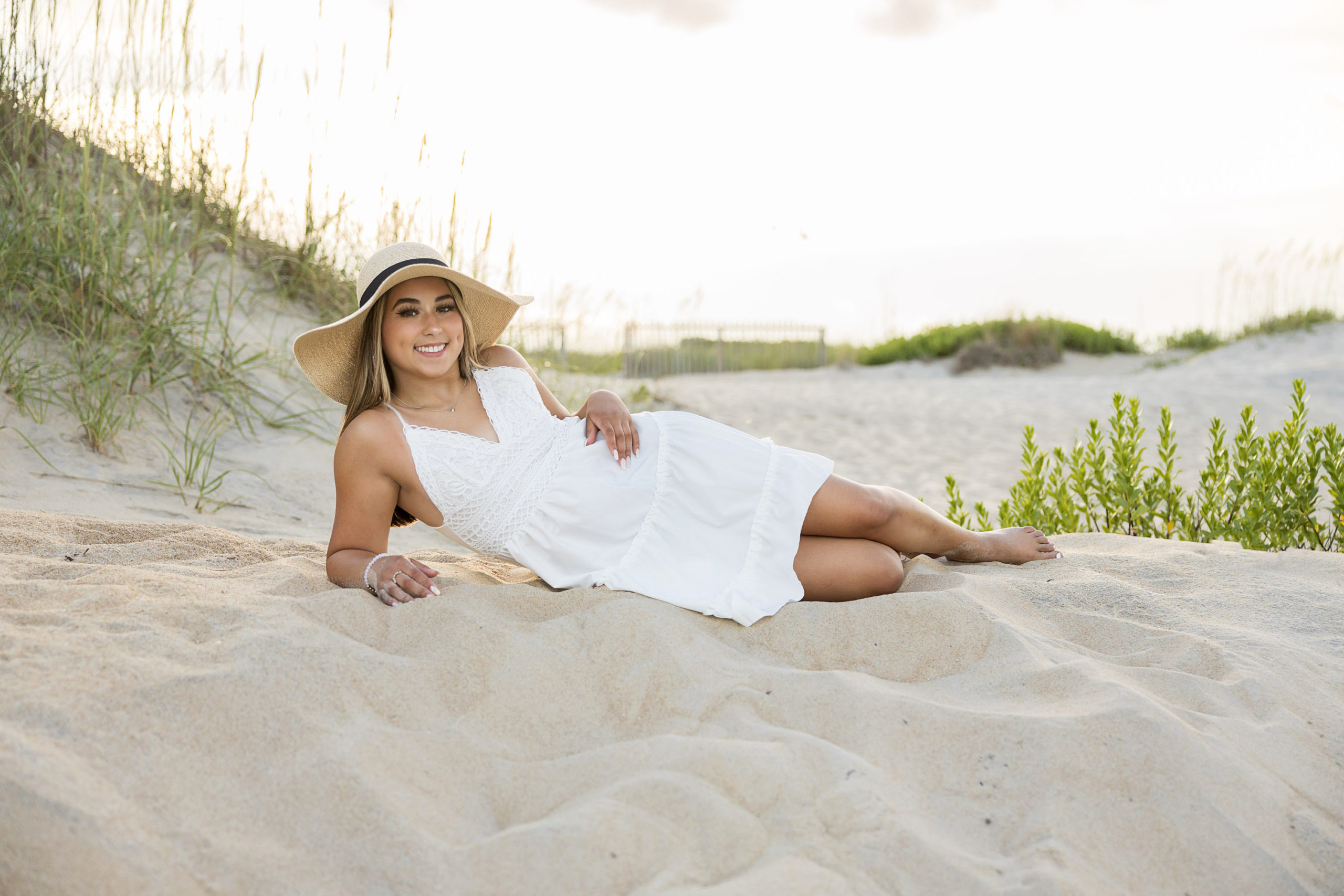 outerbanks North carolina , beach senior portraits, nags head, lighthouse , Bodie island lighthouse , destination senior portraits , senior pics , beach senior pictures , golden sunshine senior portraits , senior girl ,class of 2023 , sarah hilts photogrpahy, nc senior photographer , obx senior photographer , nags head senior portraits