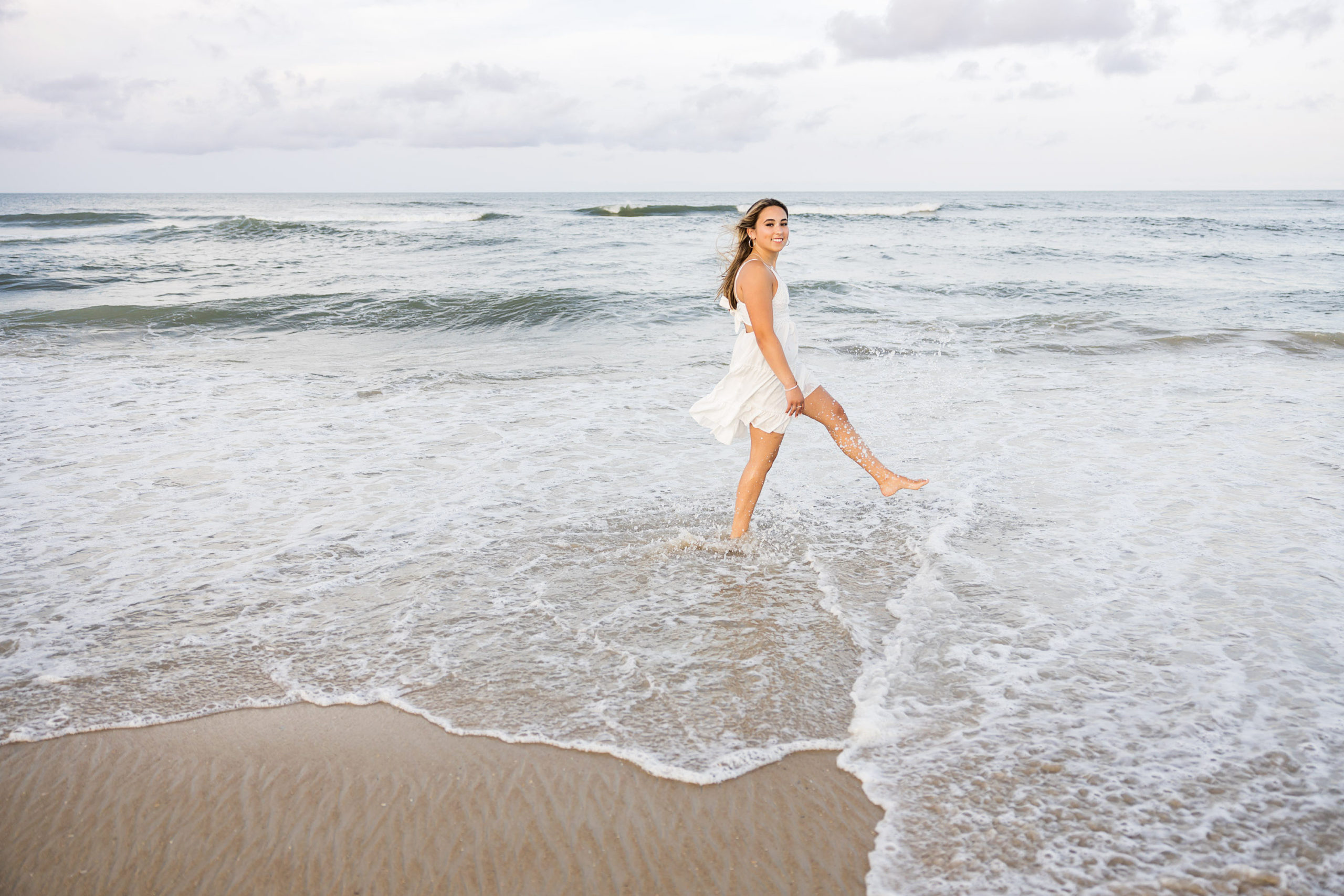 outerbanks North carolina , beach senior portraits, nags head, lighthouse , Bodie island lighthouse , destination senior portraits , senior pics , beach senior pictures , golden sunshine senior portraits , senior girl ,class of 2023 , sarah hilts photogrpahy, nc senior photographer , obx senior photographer , nags head senior portraits