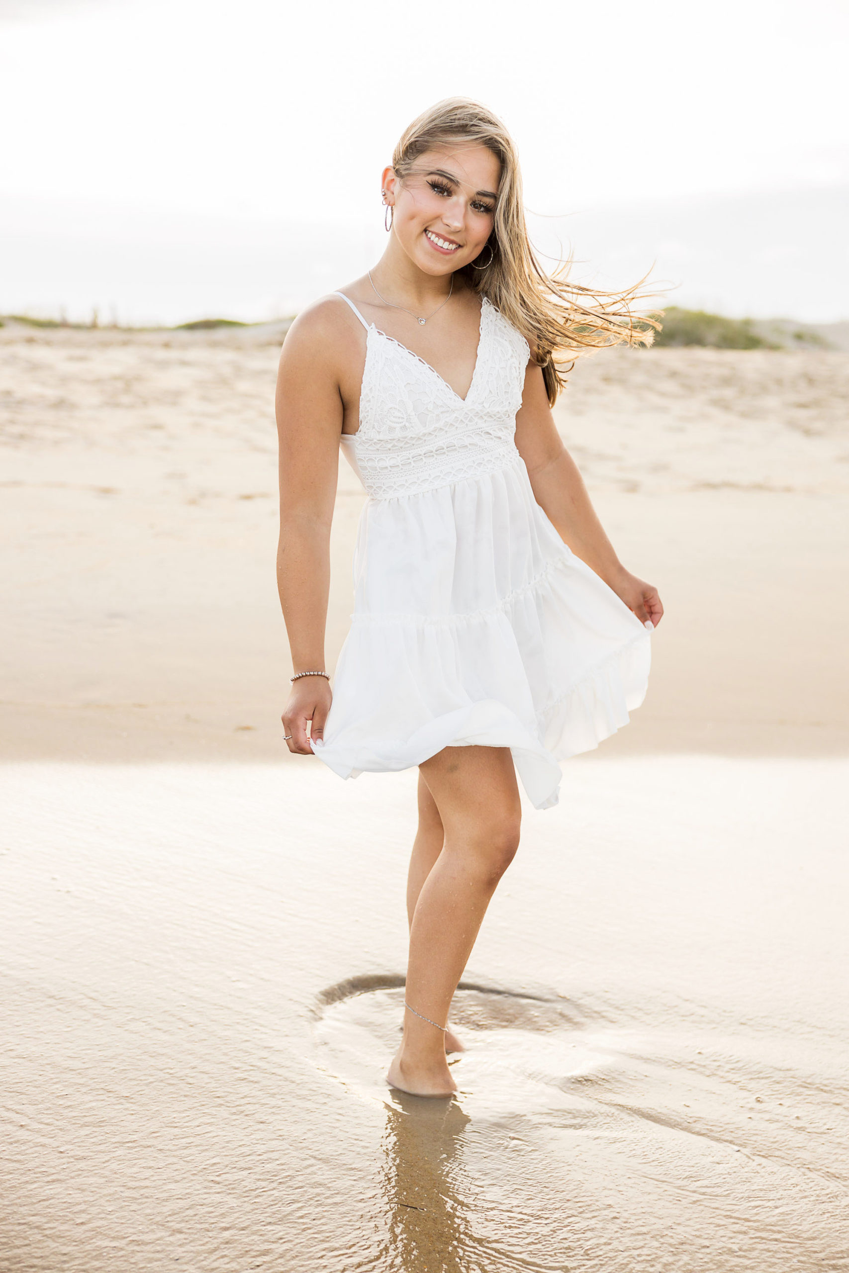 outerbanks North carolina , beach senior portraits, nags head, lighthouse , Bodie island lighthouse , destination senior portraits , senior pics , beach senior pictures , golden sunshine senior portraits , senior girl ,class of 2023 , sarah hilts photogrpahy, nc senior photographer , obx senior photographer , nags head senior portraits