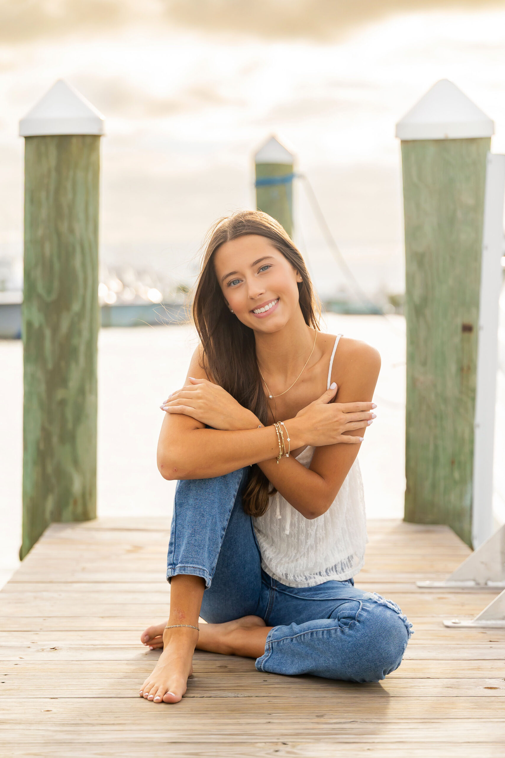 Coastal senior photography at Pirates Cove marina