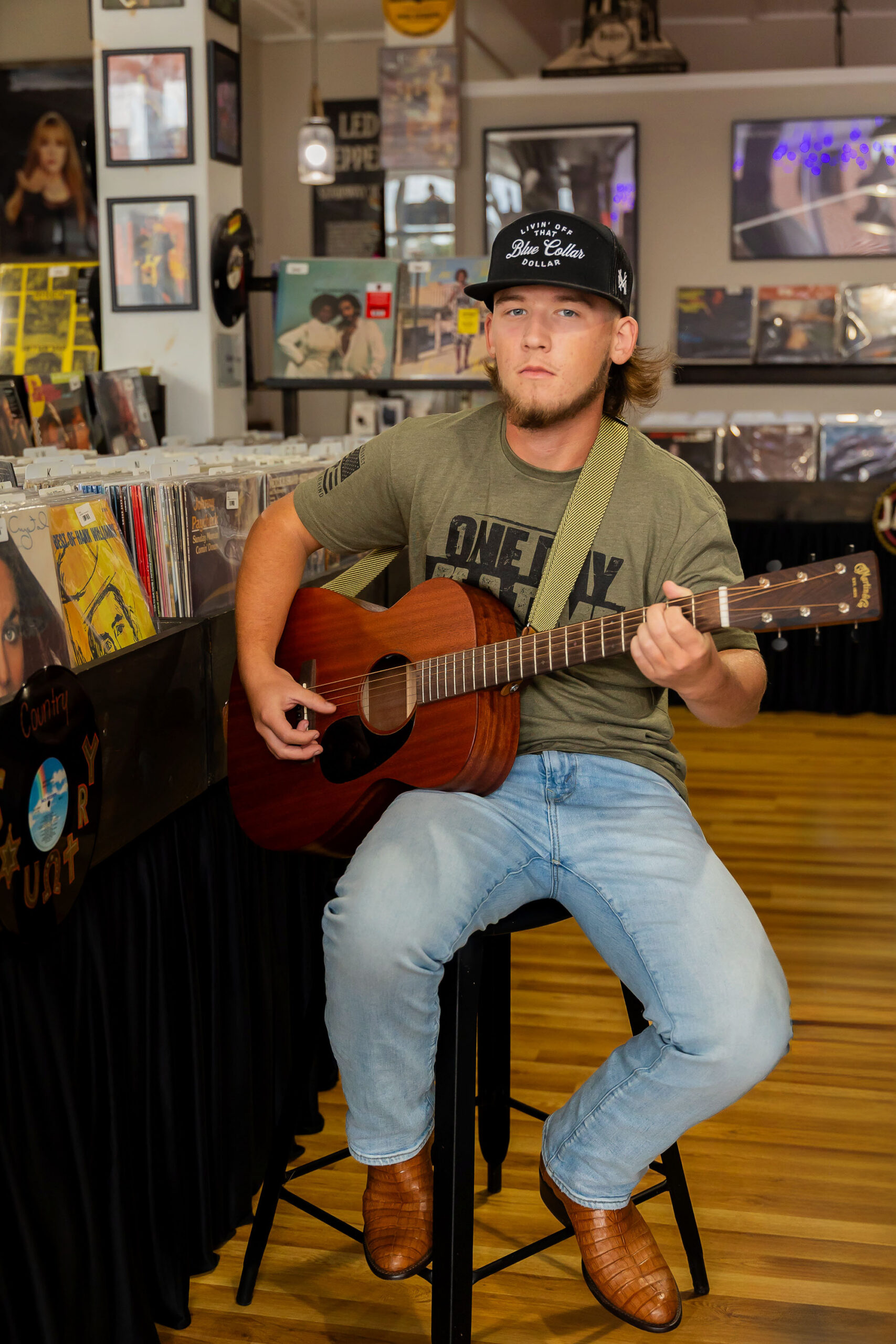 senior boy with guitar record store Elizabeth City NC