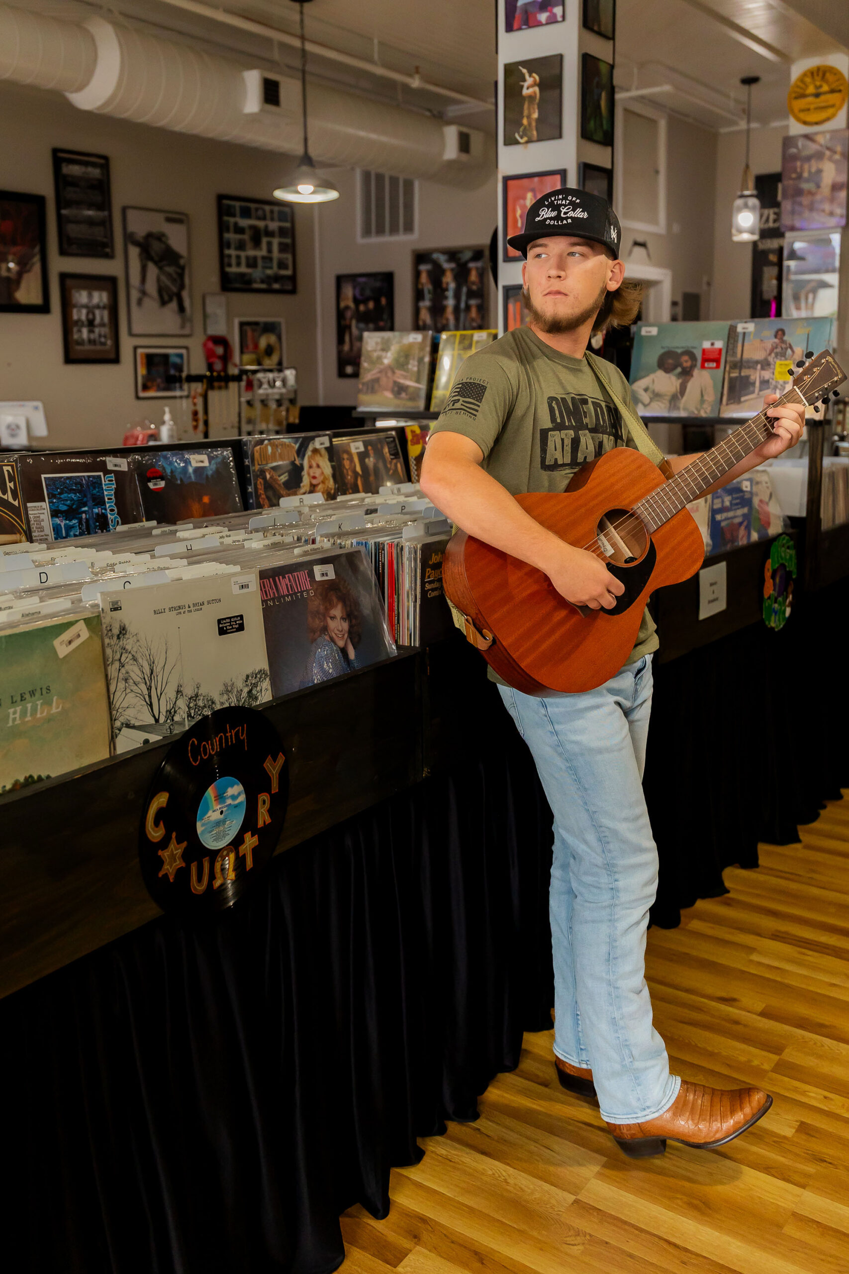 senior boy with guitar record store Elizabeth City NC